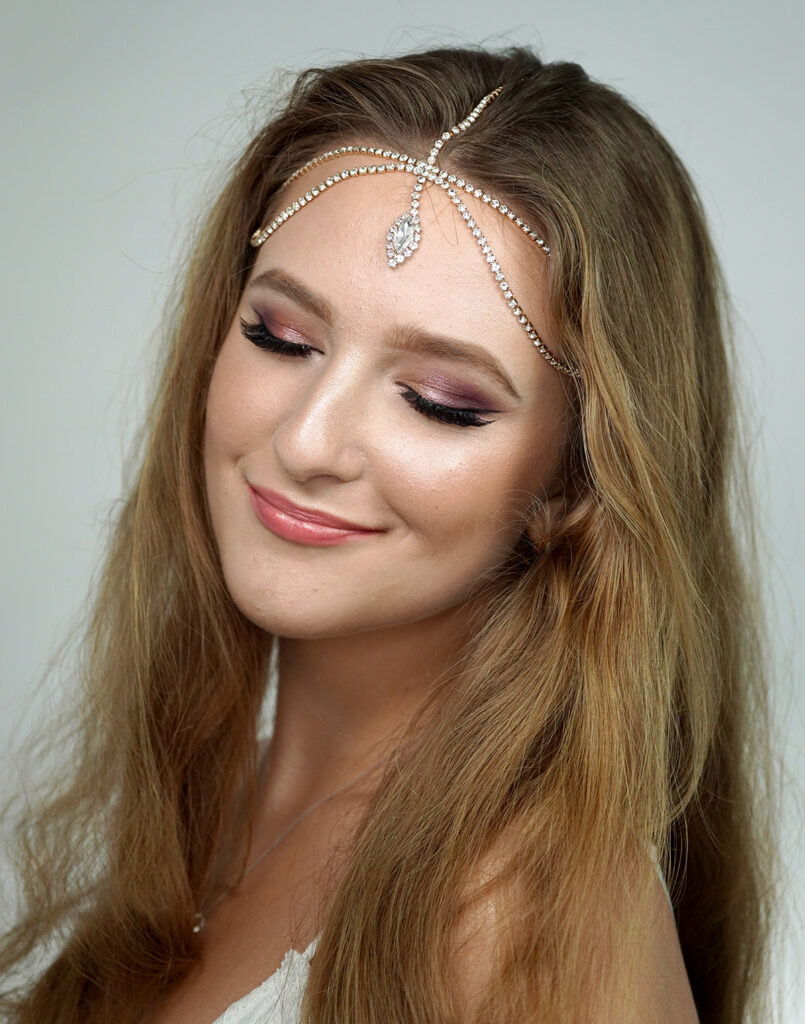 Female model Marina Krivonossova poses for a make-up themed photoshoot.